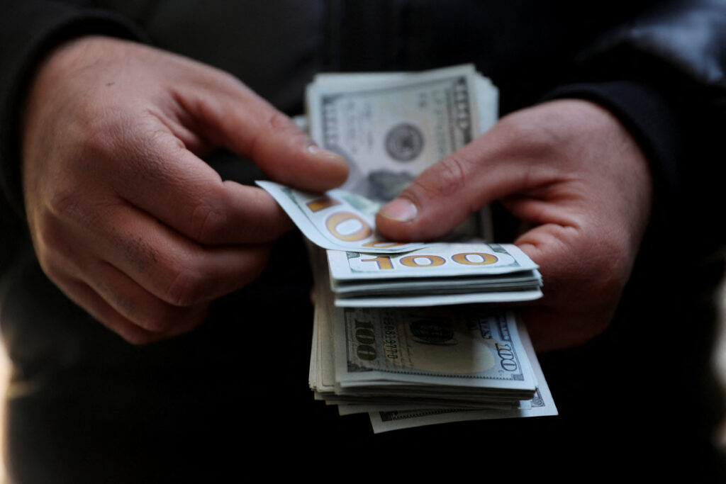 Notas de dólar 20 de dezembro de 2025 Majid Asgaripour/WANA (Agência de Notícias da Ásia Ocidental) via REUTERS