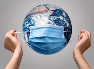 Ilustração do planeta terra usando máscara. Conceito de pandemia, doenças infecciosas. Metrópoles