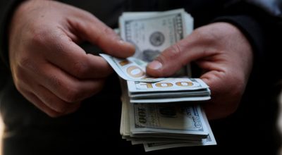 Notas de dólar 20 de dezembro de 2025 Majid Asgaripour/WANA (Agência de Notícias da Ásia Ocidental) via REUTERS